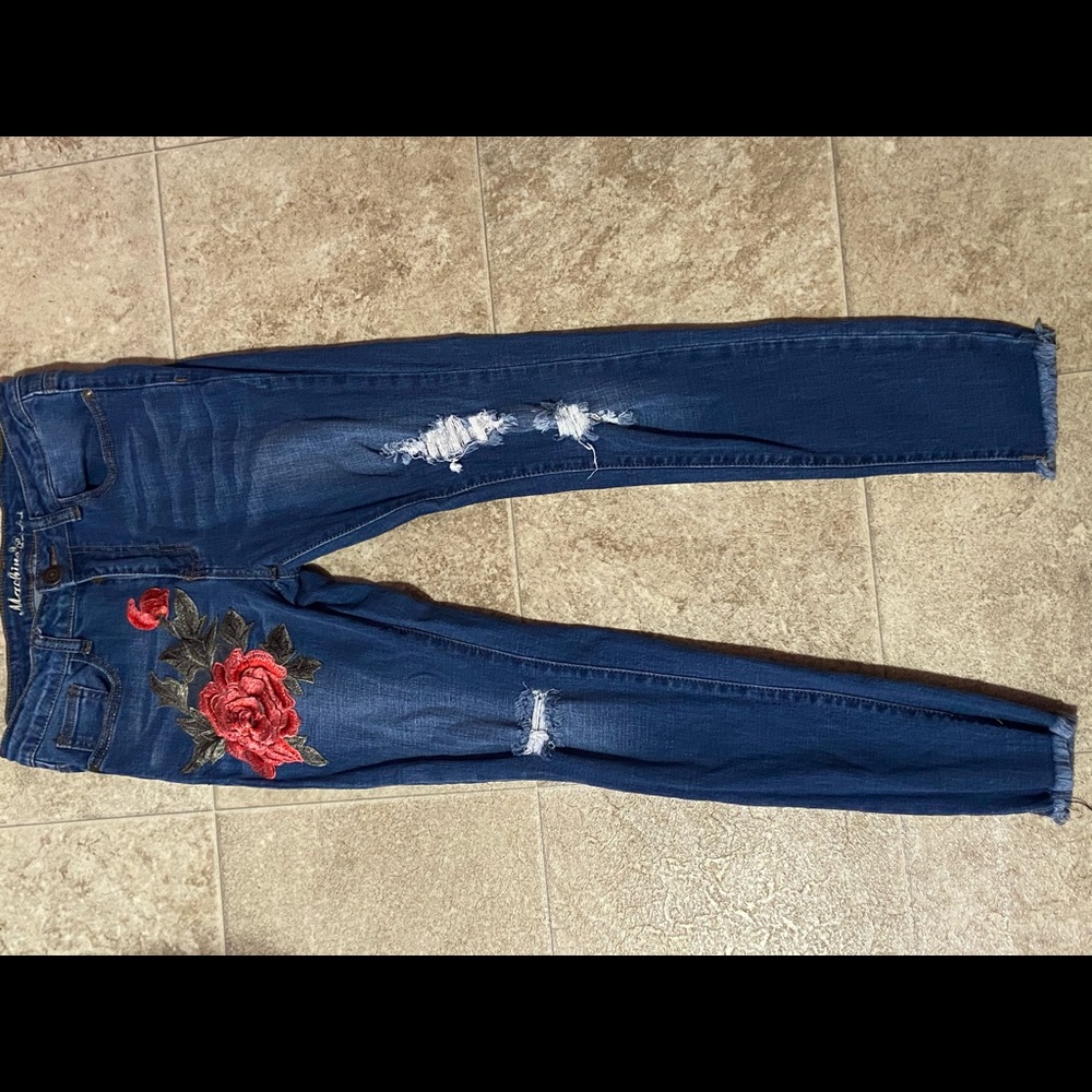 flower embroidered ripped jeans